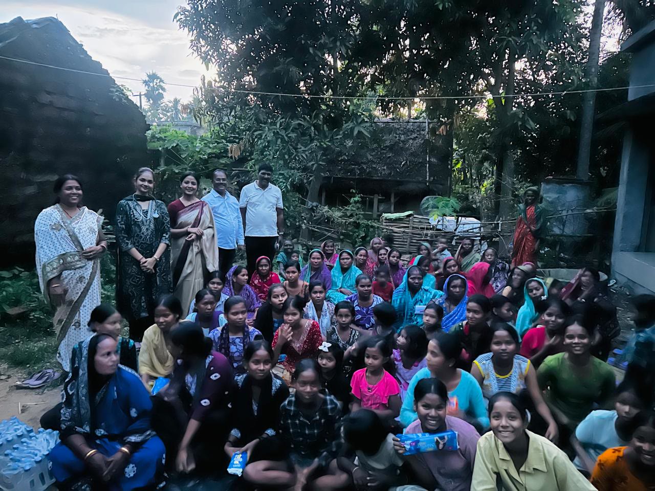 Women, girls, health professionals and SilverLine team members gathered after the menstrual health camp in Balipatana